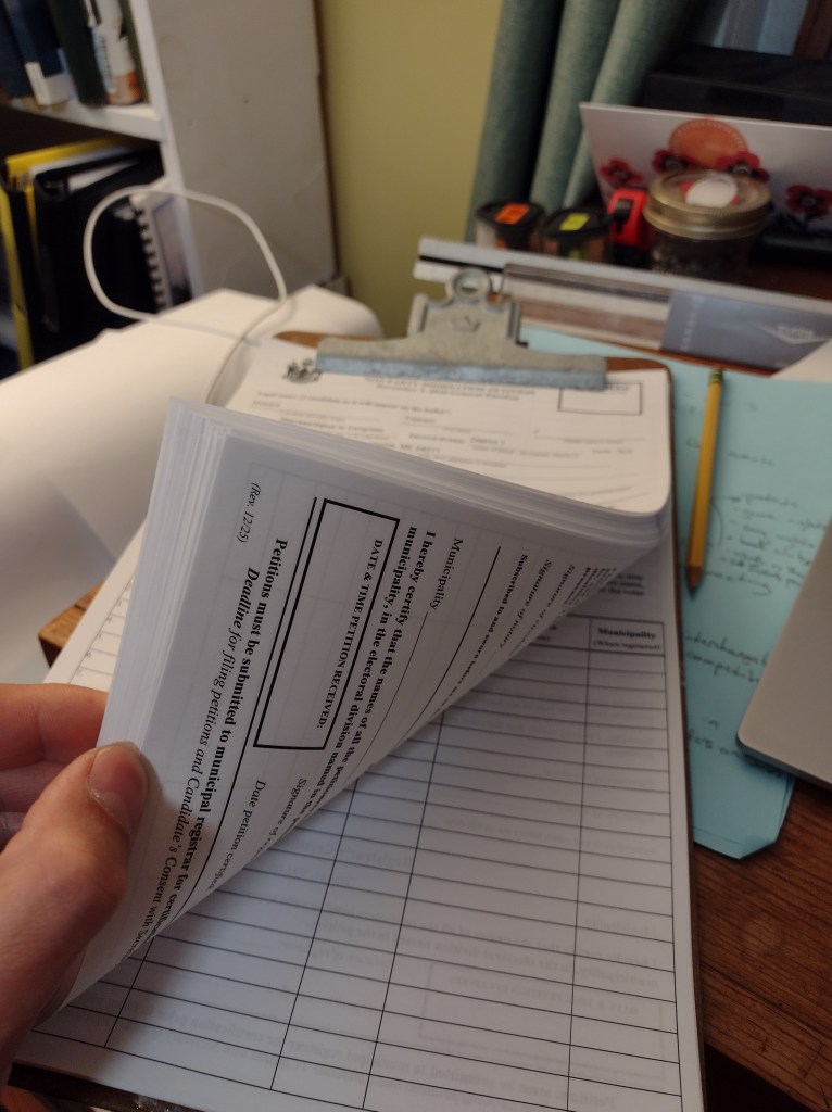 a fat stack of 70 non-party nomination petitions, currently empty, proposing to nominate Tristram Howard for the ballot in the 2026 Election for Maine's 1st US Congressional District